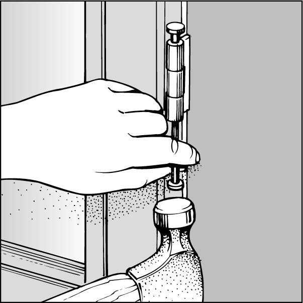 Figure 3-1: Hinges with an open bottom have hinge pins that you can remove by tapping a large nail into the bottom of the hinge, driving the pin up and out.